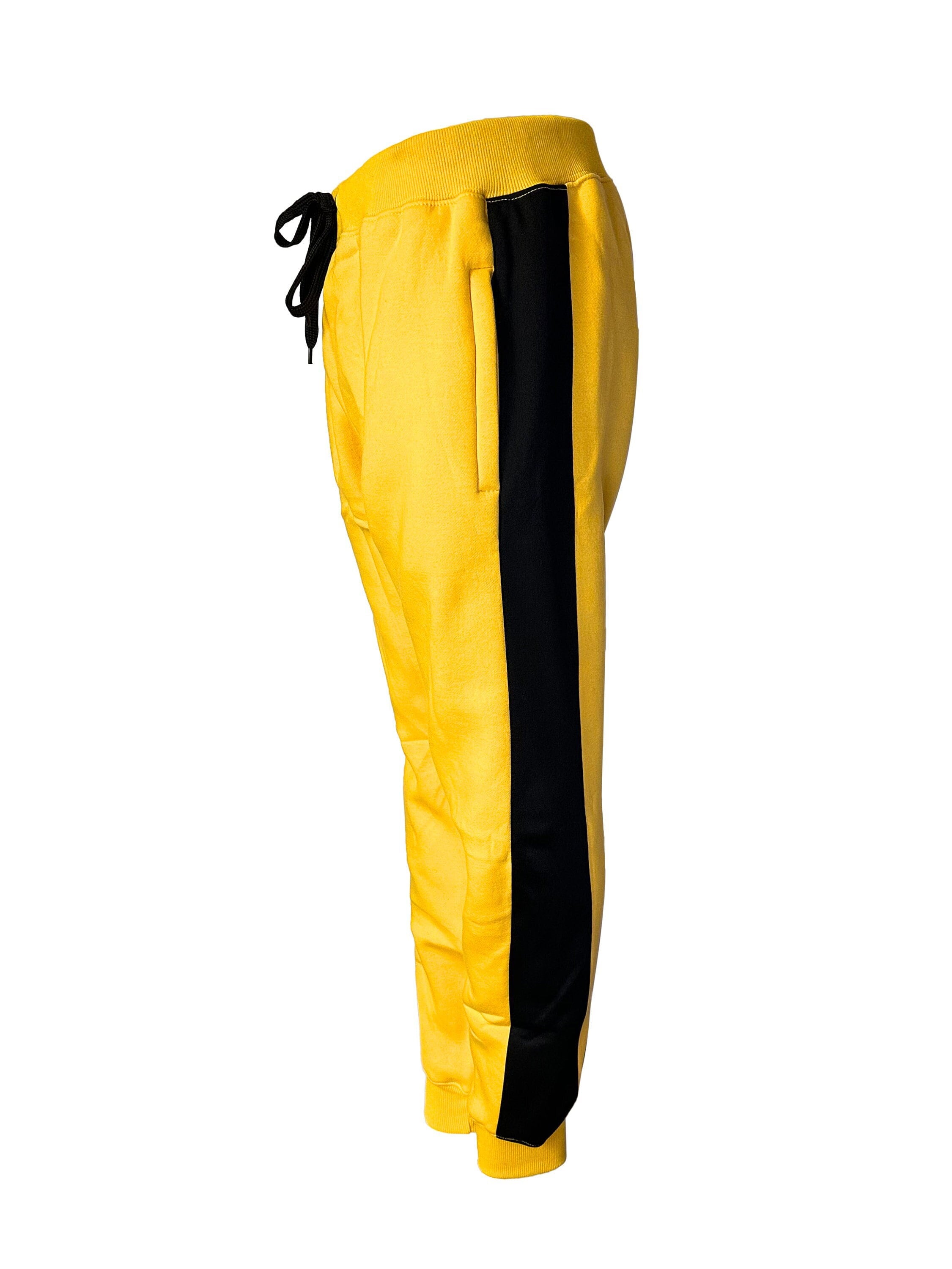 Black joggers yellow stripe on sale